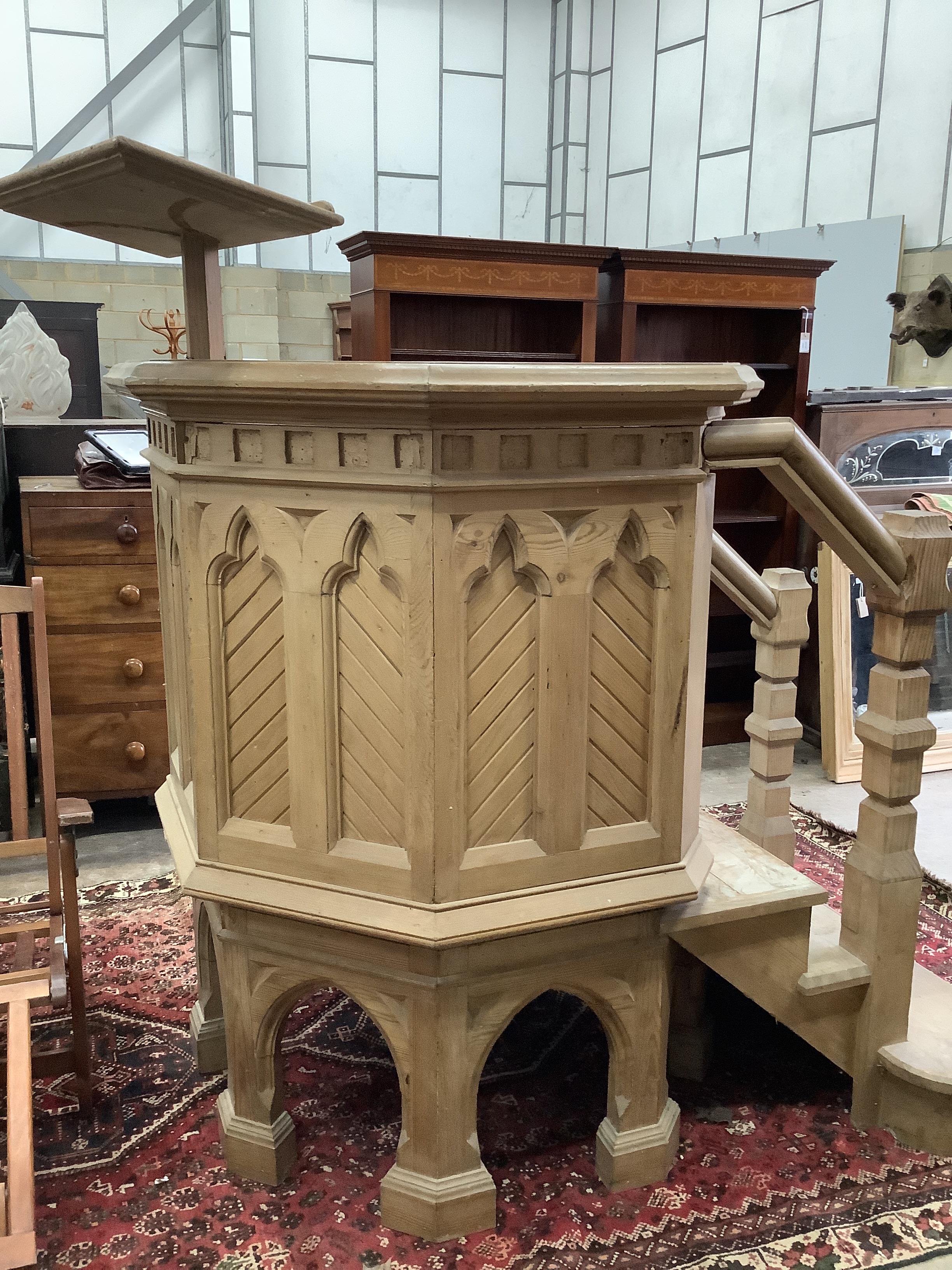A Pugin style pitch pine pulpit with lecturn, height 165cm